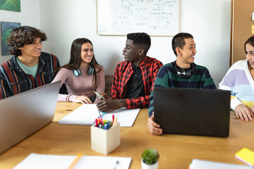 Summer marketing interns having a group discussion