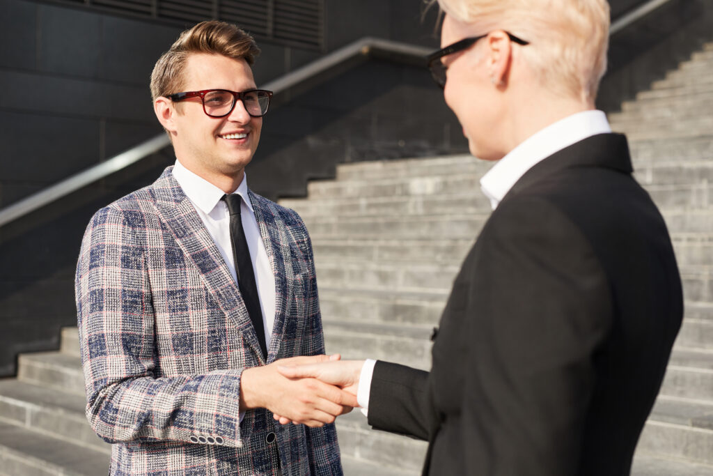 A professional making a good first impression with a strong market expansion strategy